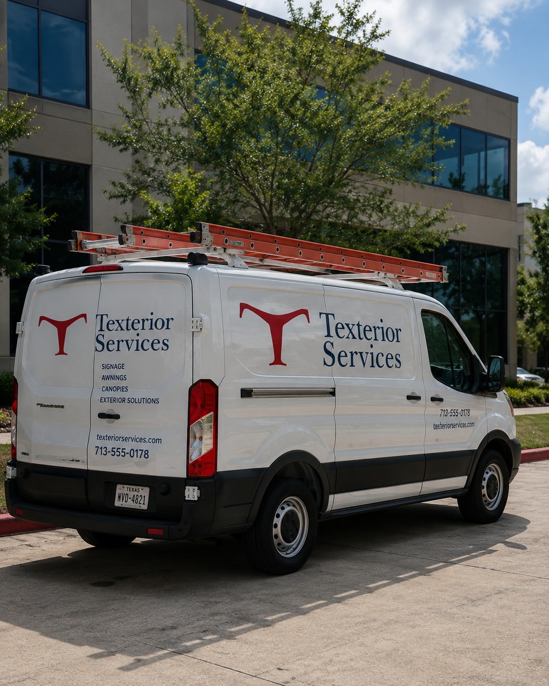 Texterior Services van with ladder rack parked outside a commercial office building